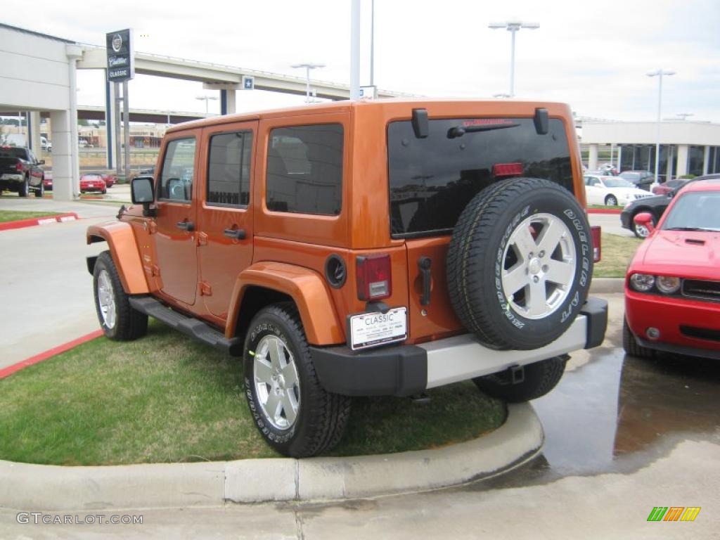 2011 Wrangler Unlimited Sahara 4x4 - Mango Tango Pearl / Black/Dark Saddle photo #3