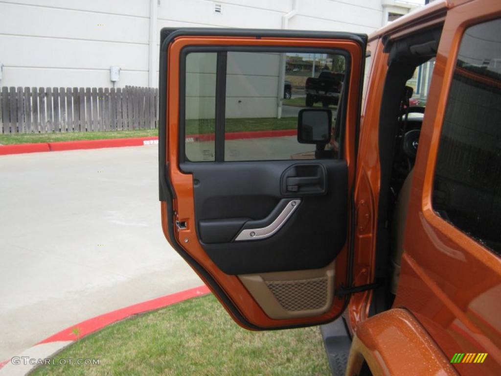 2011 Wrangler Unlimited Sahara 4x4 - Mango Tango Pearl / Black/Dark Saddle photo #16