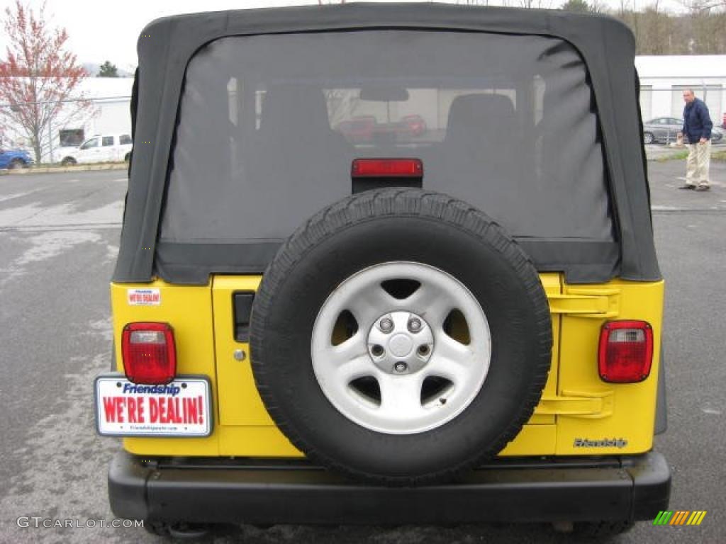 2004 Wrangler Sport 4x4 - Solar Yellow / Dark Slate Gray photo #7