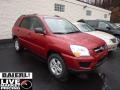 2010 Volcanic Red Kia Sportage LX V6 4x4  photo #1