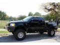 2002 Black Ford F150 XLT SuperCab 4x4  photo #2