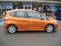 Orange Revolution Metallic 2009 Honda Fit Sport Exterior