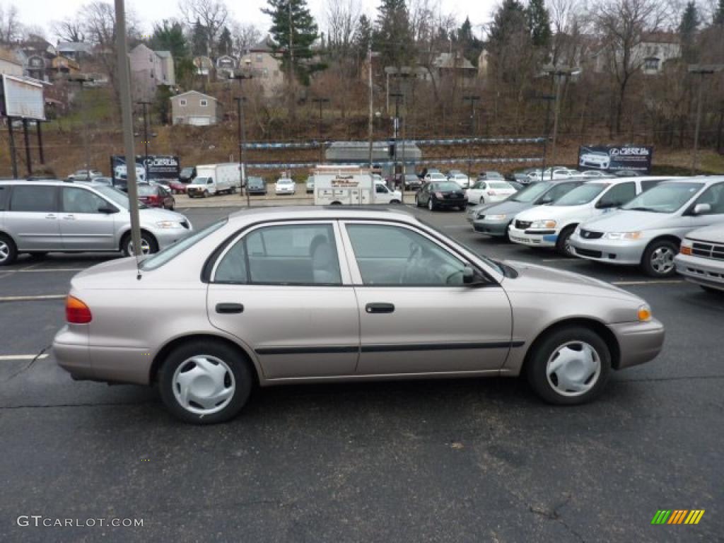 Light Gold Metallic 2000 Chevrolet Prizm Standard Prizm Model Exterior Photo #47438868