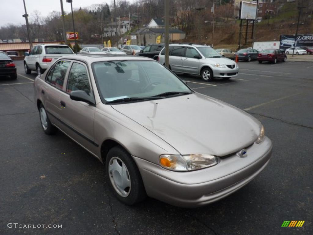 Light Gold Metallic 2000 Chevrolet Prizm Standard Prizm Model Exterior Photo #47438880