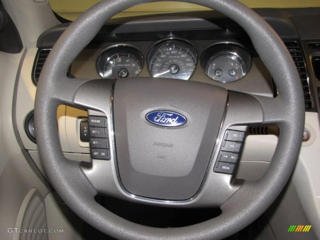 2010 Ford Taurus SE Light Stone Steering Wheel Photo #47443638