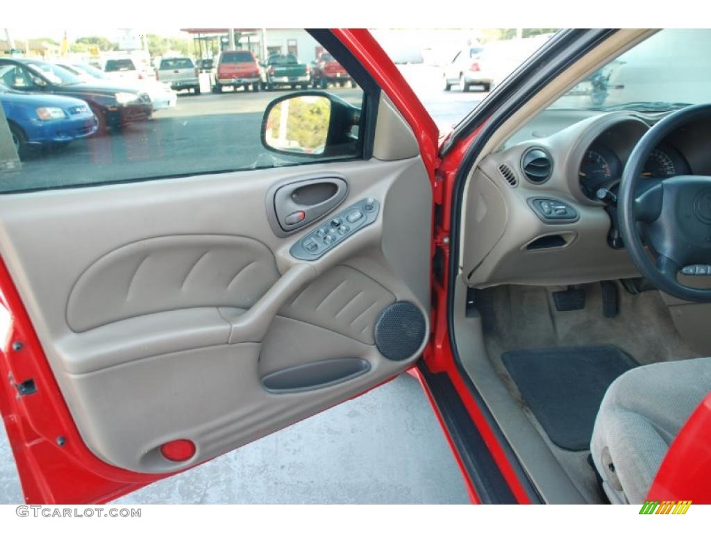 2000 Pontiac Grand Am SE Sedan Dark Taupe Door Panel Photo #47455213