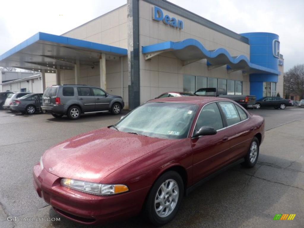 Ruby Red Oldsmobile Intrigue
