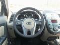 2011 Kia Soul Sand/Black Houndstooth Cloth Interior Steering Wheel Photo