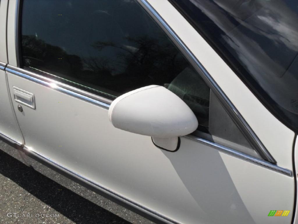 1994 Fleetwood Brougham Sedan - White / Burgundy photo #24