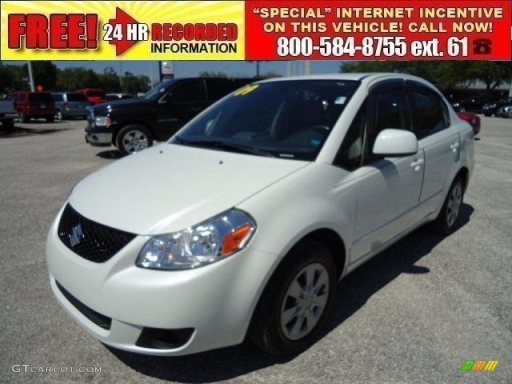 2009 SX4 Sedan LE - White Water Pearl / Beige photo #1