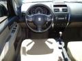 2009 White Water Pearl Suzuki SX4 Sedan LE  photo #9