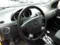 Charcoal Steering Wheel Photo for 2006 Chevrolet Aveo #47549084