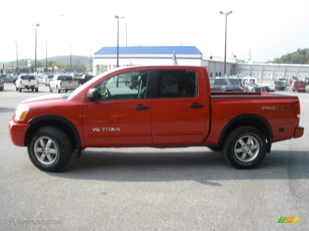 2010 Titan PRO-4X Crew Cab 4x4 - Red Alert / Charcoal photo #6