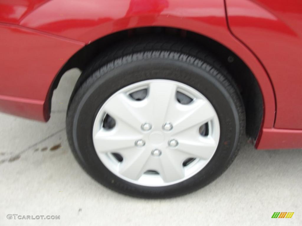 2005 Focus ZX4 S Sedan - Sangria Red Metallic / Dark Flint/Light Flint photo #14