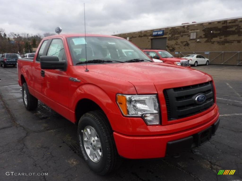 2011 F150 STX SuperCab 4x4 - Race Red / Steel Gray photo #1