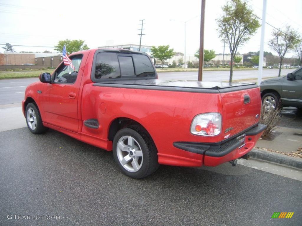 Bright Red 2001 Ford F150 SVT Lightning Exterior Photo #47600285