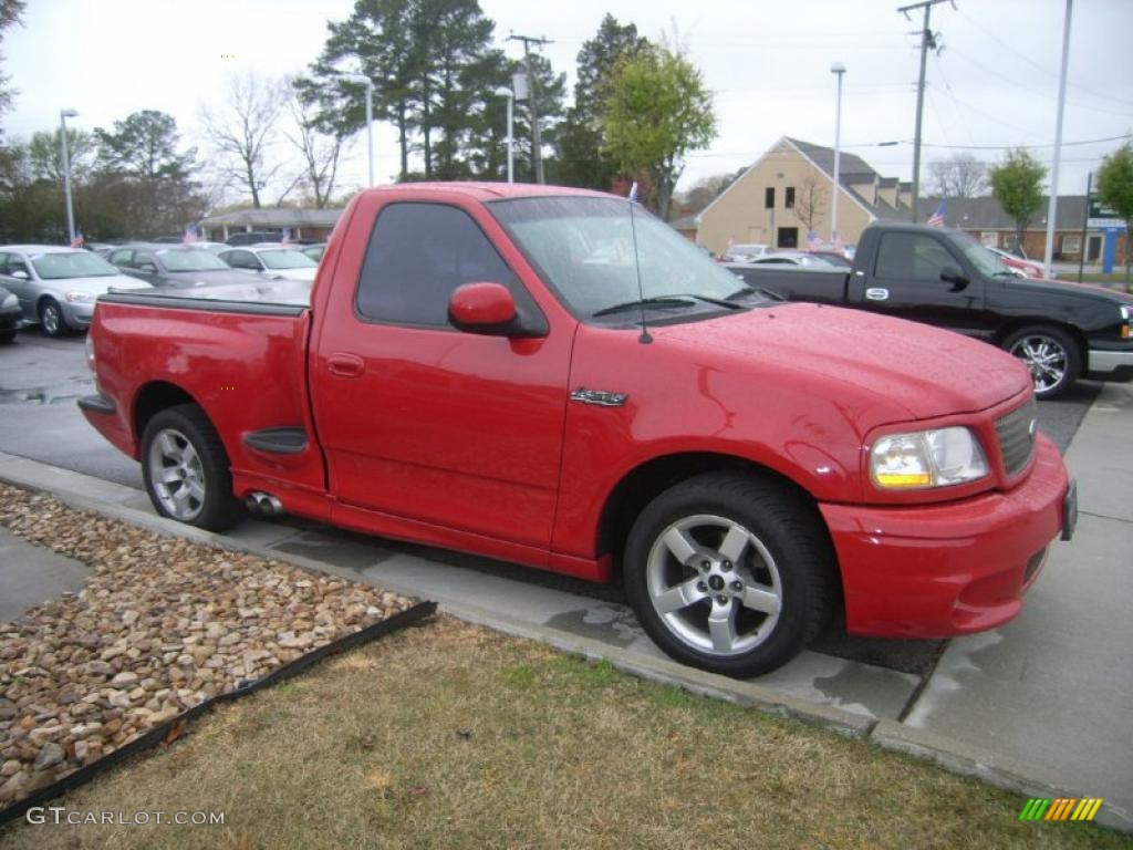 Bright Red 2001 Ford F150 SVT Lightning Exterior Photo #47600348