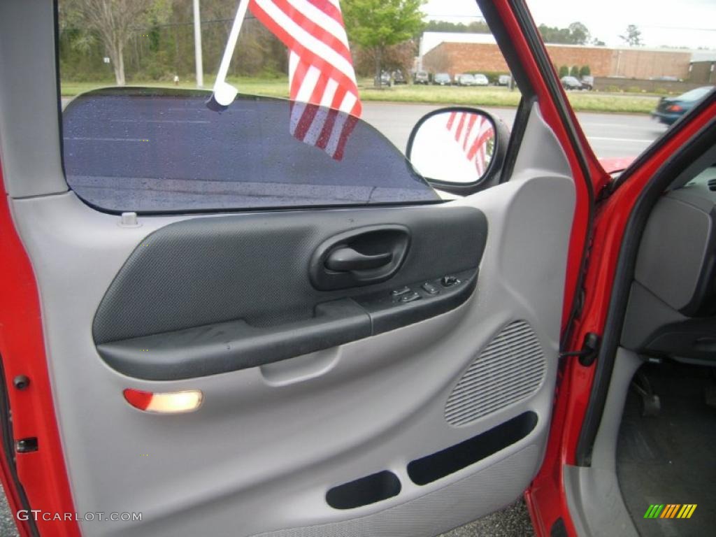 2001 Ford F150 SVT Lightning Lightning Graphite/Black Door Panel Photo #47600423