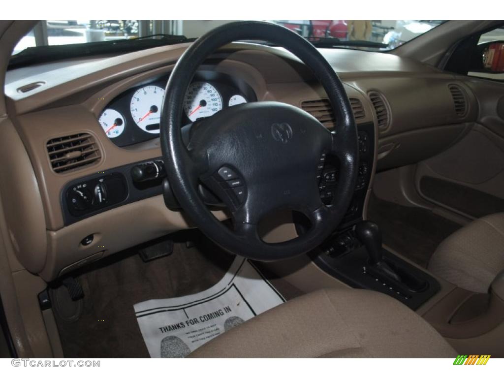 2002 Intrepid ES - Light Almond Pearl Metallic / Sandstone photo #13