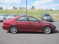 2006 Salsa Red Pearl Toyota Camry SE  photo #6