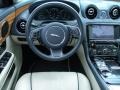 2011 Jaguar XJ Butter Soft Ivory/Navy Blue w/Satin Zebrano Wood Interior Controls Photo