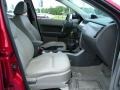 2010 Sangria Red Metallic Ford Focus SEL Sedan  photo #16