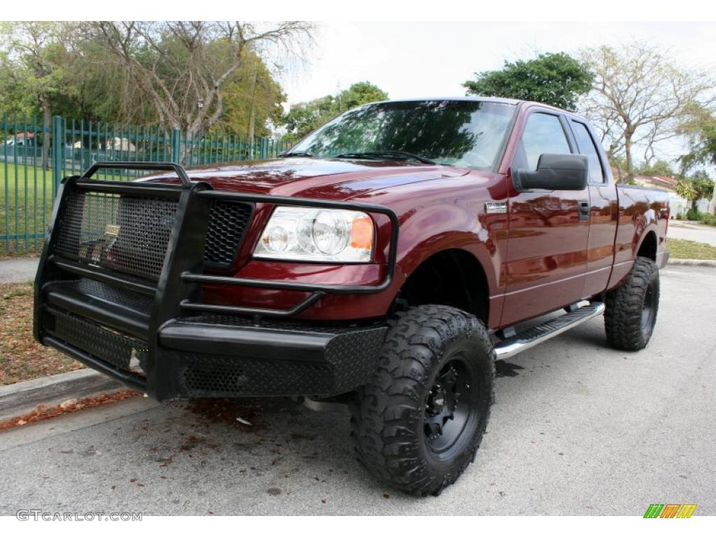 2006 F150 XLT SuperCab 4x4 - Dark Toreador Red Metallic / Medium/Dark Flint photo #1