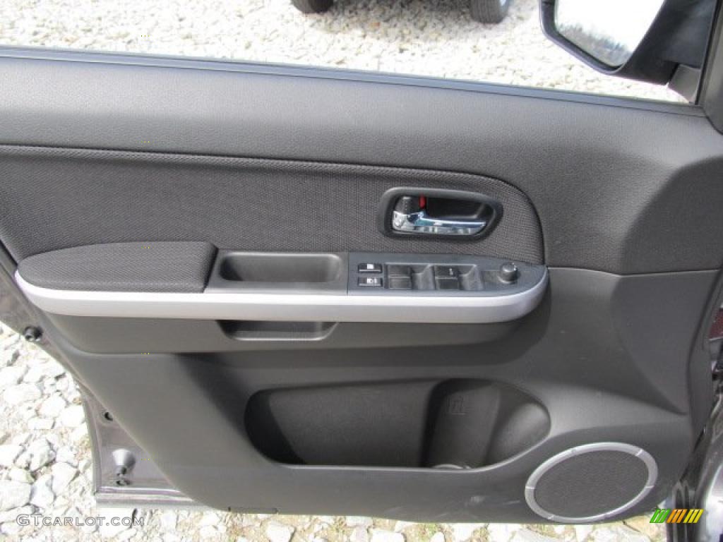 2011 Suzuki Grand Vitara Premium 4x4 Black Door Panel Photo #47712768