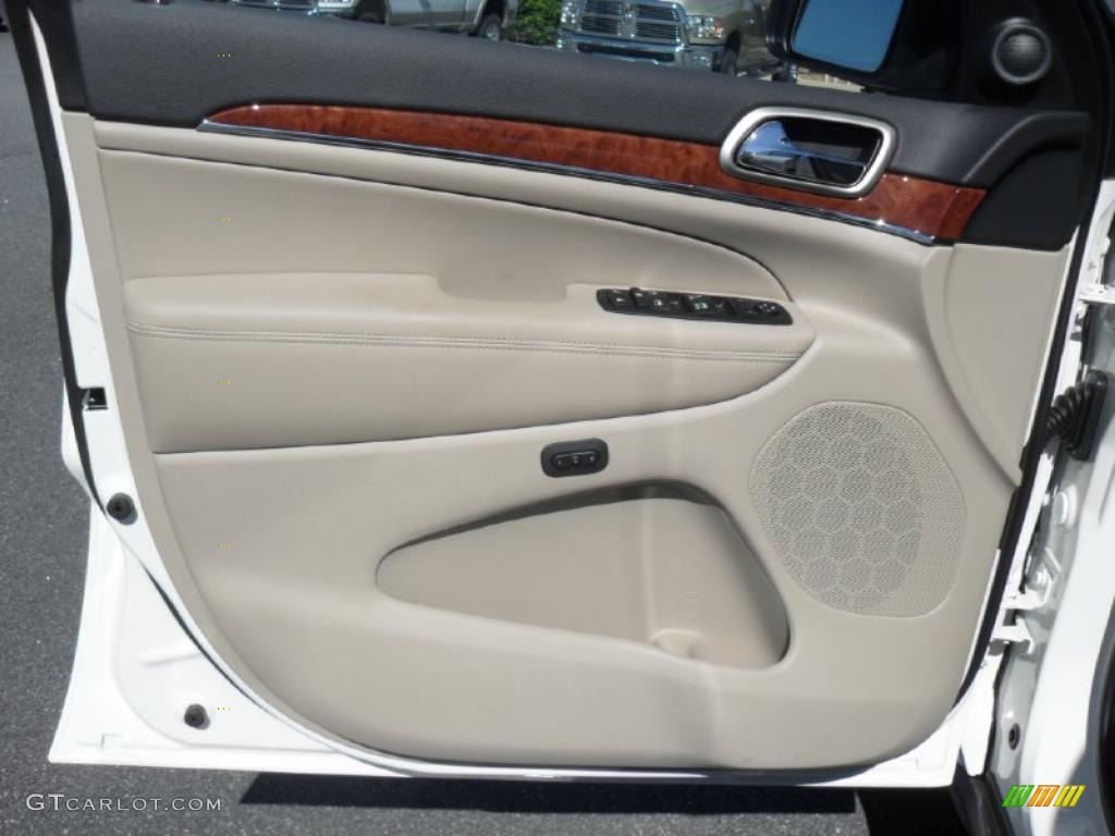 2011 Jeep Grand Cherokee Limited 4x4 Black/Light Frost Beige Door Panel Photo #47738407