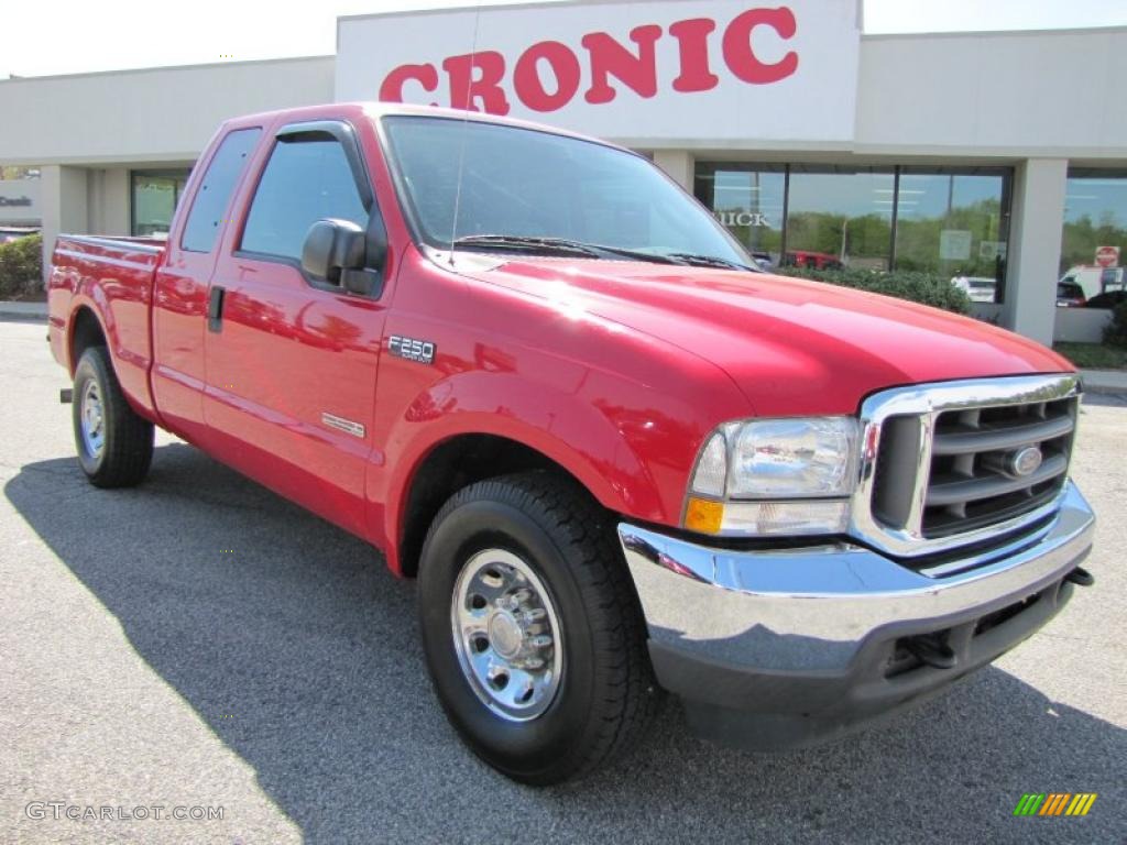 2004 F250 Super Duty XLT SuperCab - Red / Medium Flint photo #1