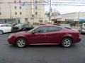 2005 Sport Red Metallic Pontiac Grand Prix GT Sedan  photo #2