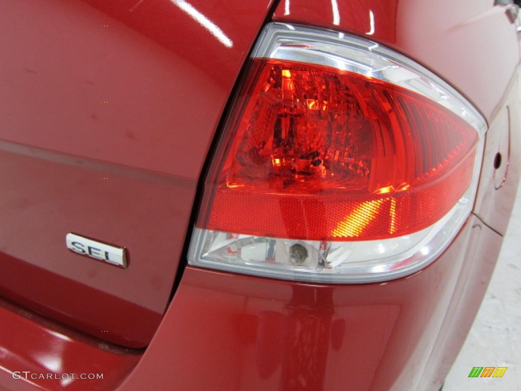 2010 Focus SEL Sedan - Sangria Red Metallic / Medium Stone photo #11