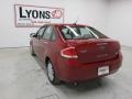 2010 Sangria Red Metallic Ford Focus SEL Sedan  photo #12