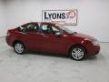 2010 Sangria Red Metallic Ford Focus SEL Sedan  photo #20