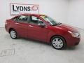 2010 Sangria Red Metallic Ford Focus SEL Sedan  photo #21