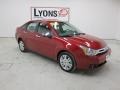 2010 Sangria Red Metallic Ford Focus SEL Sedan  photo #22