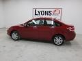 2010 Sangria Red Metallic Ford Focus SEL Sedan  photo #31