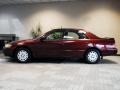 1999 Vintage Red Pearl Toyota Camry LE  photo #5