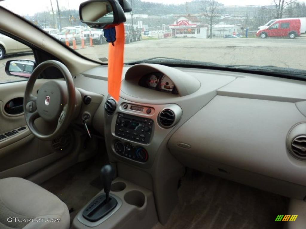 2004 ION 3 Sedan - Rain Forest Green / Tan photo #16