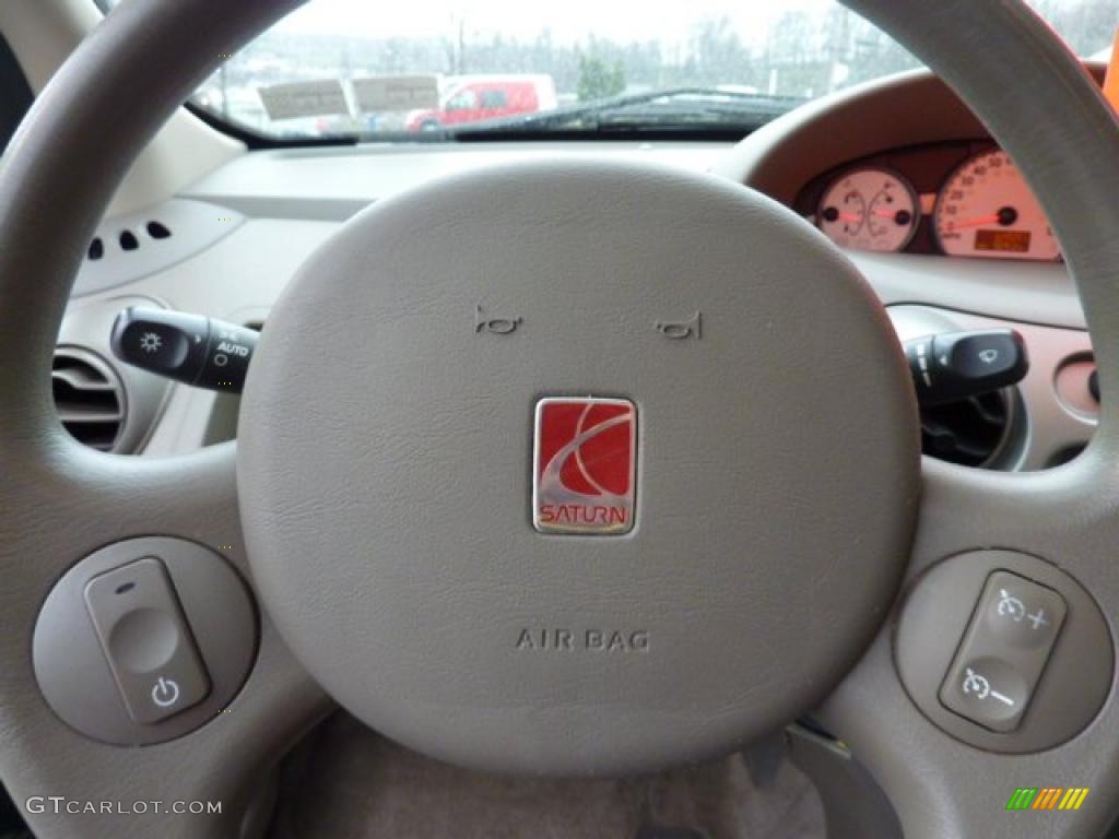 2004 ION 3 Sedan - Rain Forest Green / Tan photo #19