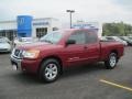 2008 Red Brawn Nissan Titan SE King Cab  photo #1