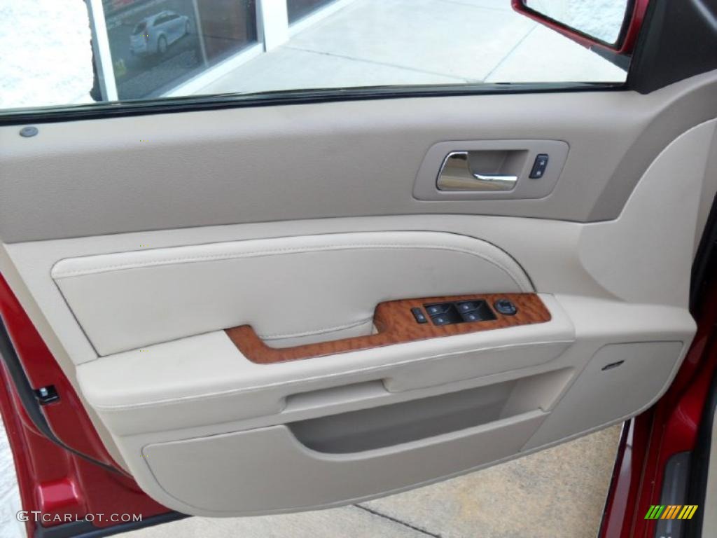 2011 Cadillac STS V6 Premium Cashmere/Dark Cashmere Door Panel Photo #47803871