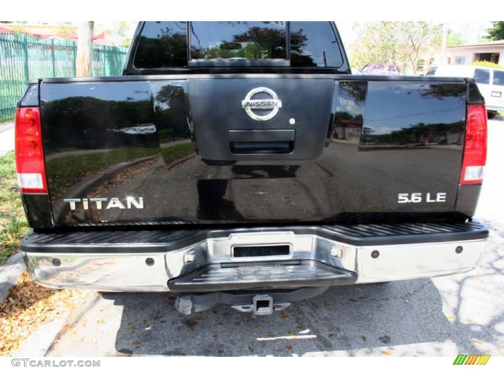 2006 Titan LE Crew Cab 4x4 - Galaxy Black / Graphite/Titanium photo #16