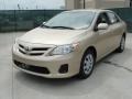 2011 Sandy Beach Metallic Toyota Corolla LE  photo #7