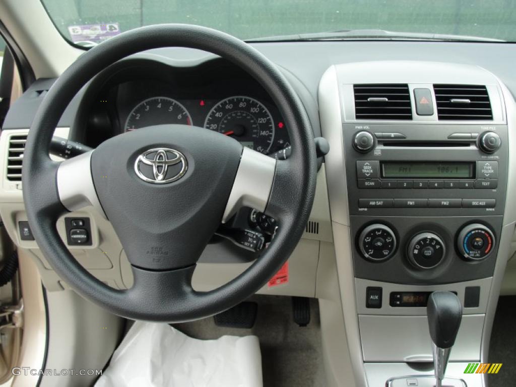 2011 Corolla LE - Sandy Beach Metallic / Bisque photo #27