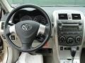 2011 Sandy Beach Metallic Toyota Corolla LE  photo #27