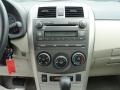 2011 Sandy Beach Metallic Toyota Corolla LE  photo #28