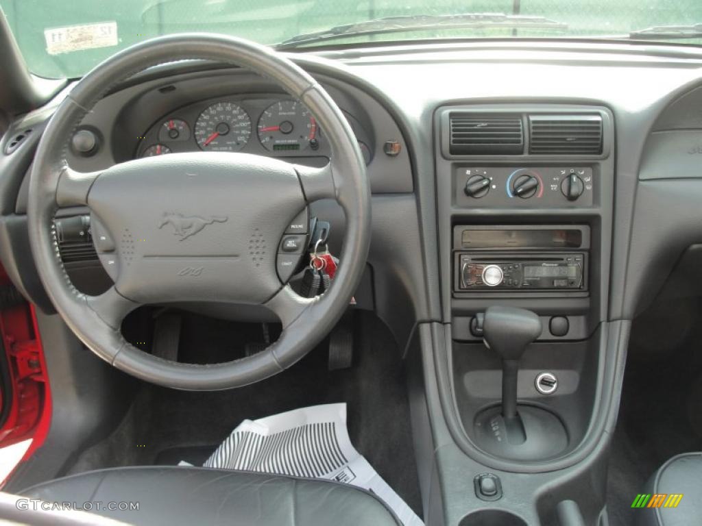 2003 Mustang V6 Convertible - Torch Red / Dark Charcoal photo #42