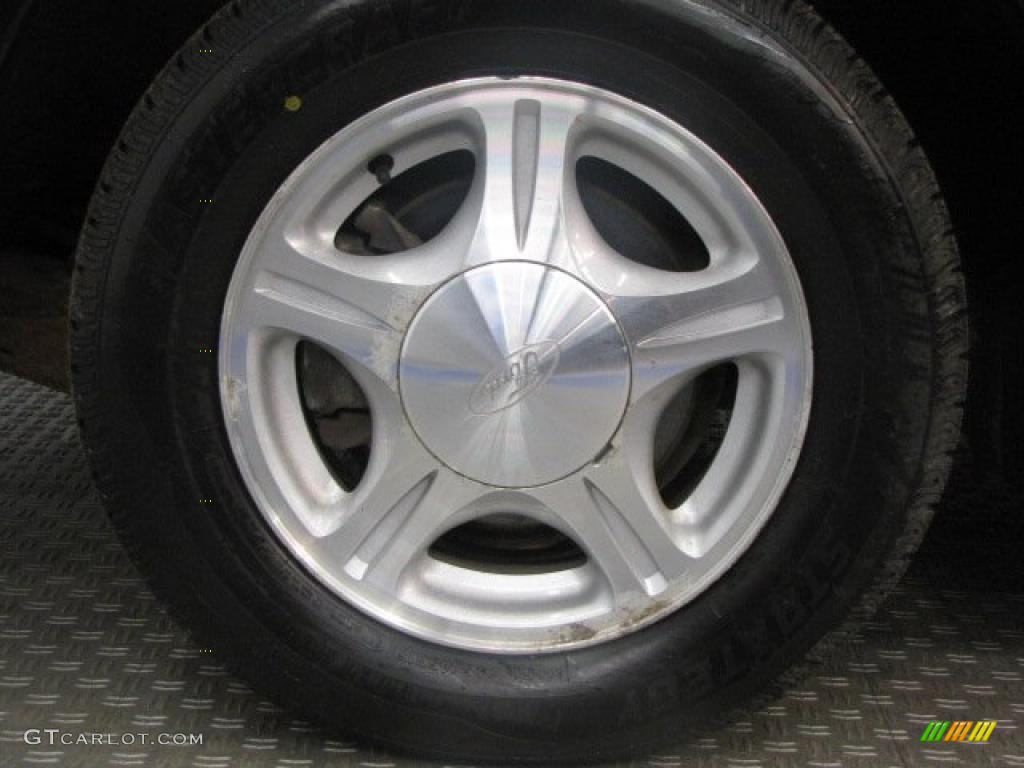 1999 Ford Taurus SE Wheel Photo #47829549