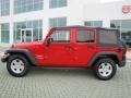 2010 Flame Red Jeep Wrangler Unlimited Sport  photo #2